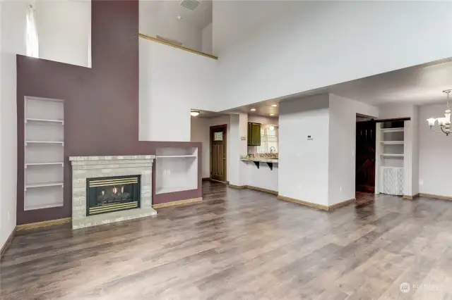 Cozy up to the gas fireplace with wonderful built-ins! The stunning engineered hardwood floors run throughout the main floor.
