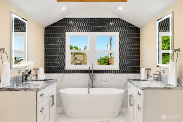 Enter into your luxury bathroom directly off of the primary.