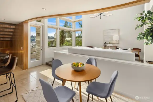 Choose from an array of dining experiences, whether it's the casual bar-height kitchen counter, the adjoining dining area, or the nearby water-view patio, offering a beautiful backdrop for alfresco dining.