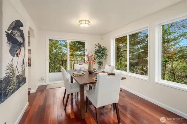 Dining area also opens to spacious deck.