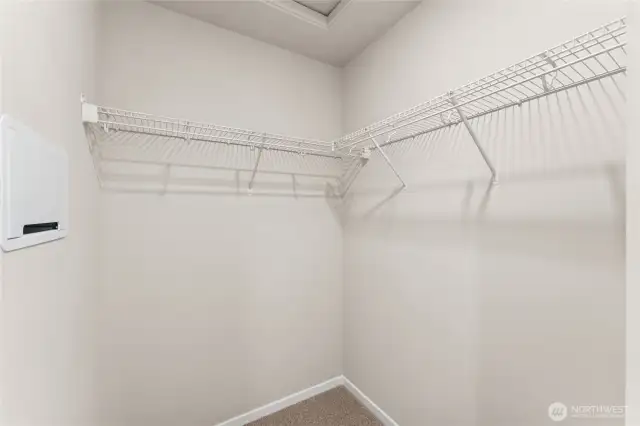 Primary closet. Photo's are for representational purposes only. Colors and finishes may differ.