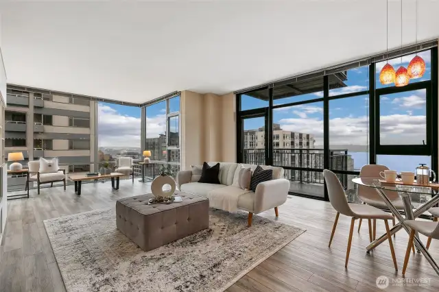 Floor to ceiling windows provide expansive city views, Mt Rainier, & Elliott Bay