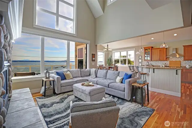 The connected living room, kitchen and dining all have magnificent views!