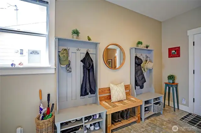 The "Mud Room" connects to the garage and man door outside.