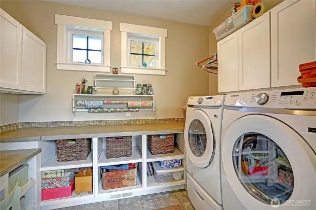 The "Craft/Wrapping" and Laundry room.