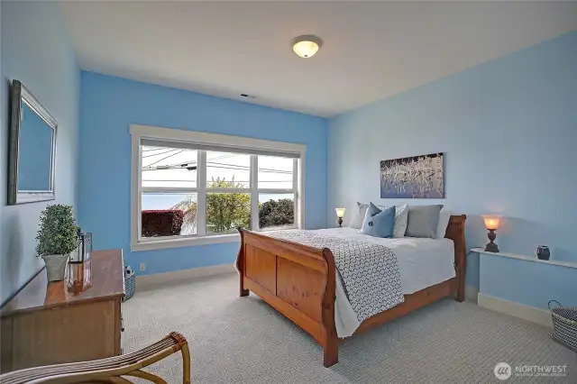 One of 2 bedrooms on the ground level, each with it's own full bath!