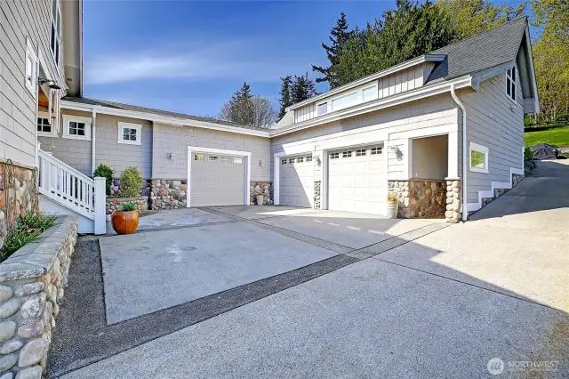 Approach to 3 car garage, apartment entry and main house