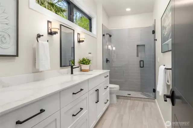 3rd Bedroom 3/4 bath ensuite with tile floors.