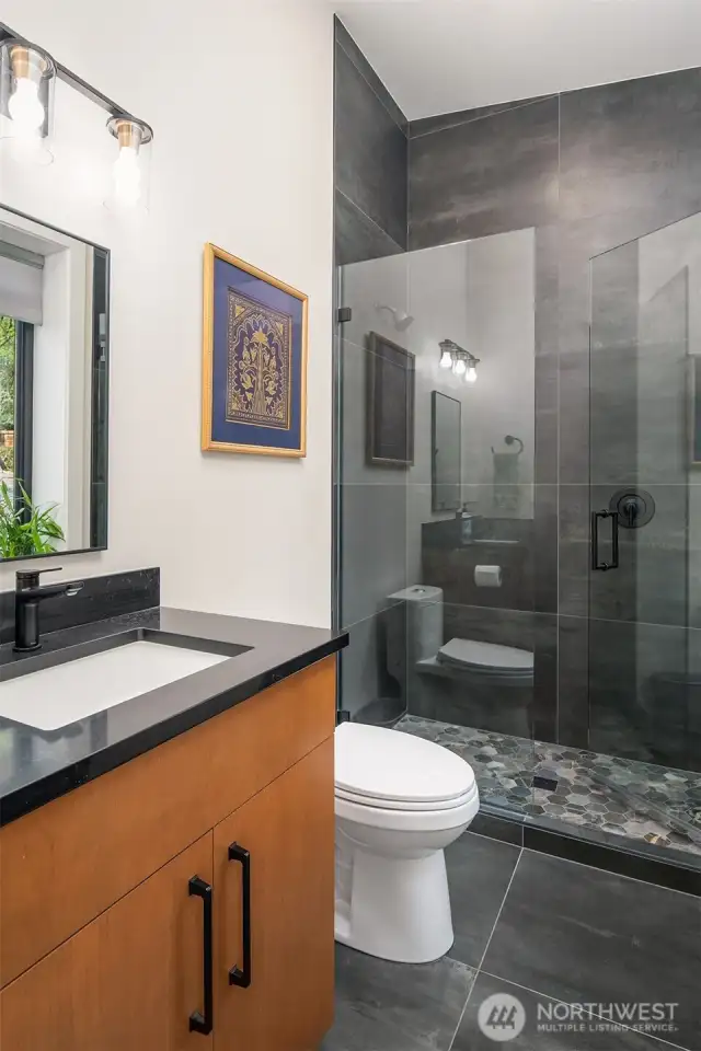 Guest bath with shower.