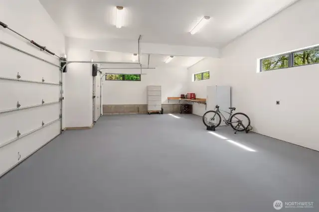 Fully finished, 996SF - 3 car garage. Wired for EV. Panel box wired for generator. Mechanical room with sprinkler system, home hydrant 350 gallon water tank "Talco Fire System". Two Rheem 80 gallon water heaters and hot water recirculation pump to keep hot water instantly available at the taps.