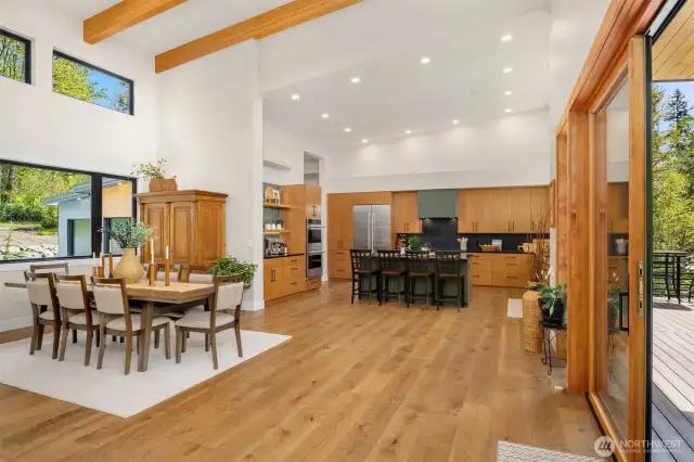 Spacious dining area and custom-designed kitchen.