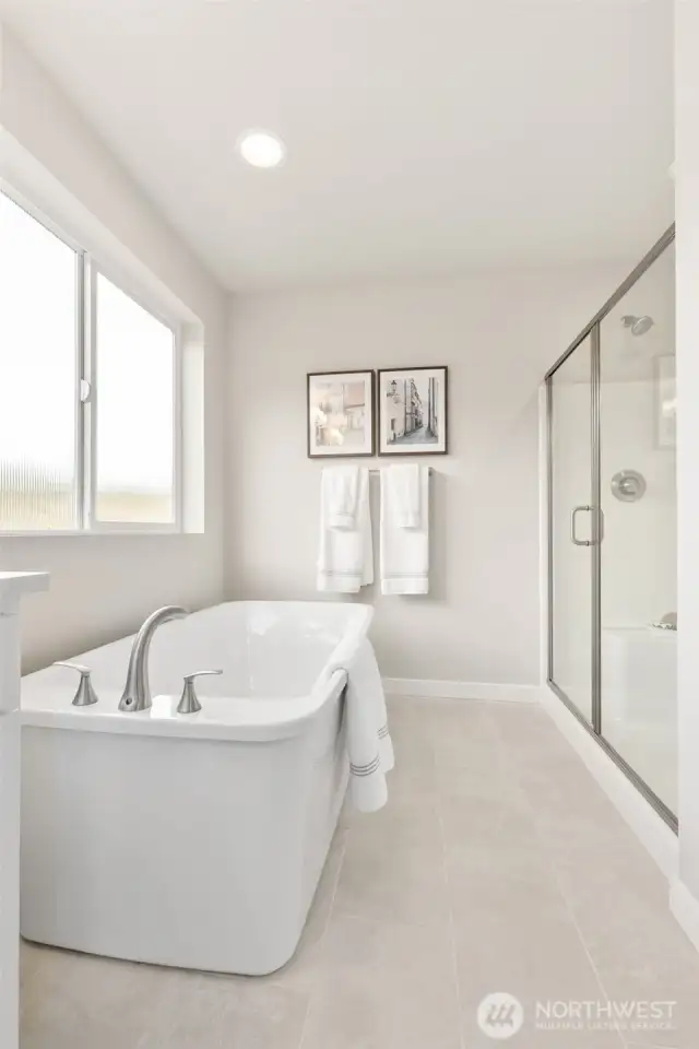 *Optional soaking tub* Pictures of same floorplan at different site. Specs/finishes differ.