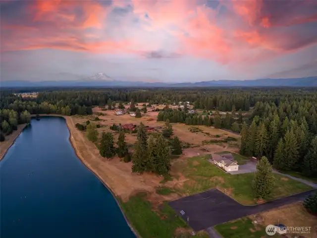 On 5 acres in a private gated lakefront community. Notice Mt. Rainier in the distance.