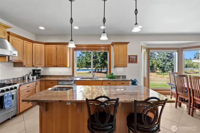 Chefs kitchen with views of the lake and heated floors!