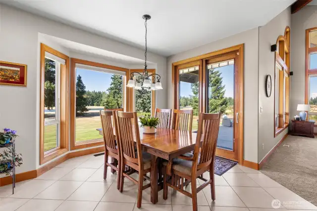 Dine with views! Notice the 8' sliding Pella doors with built in blinds.