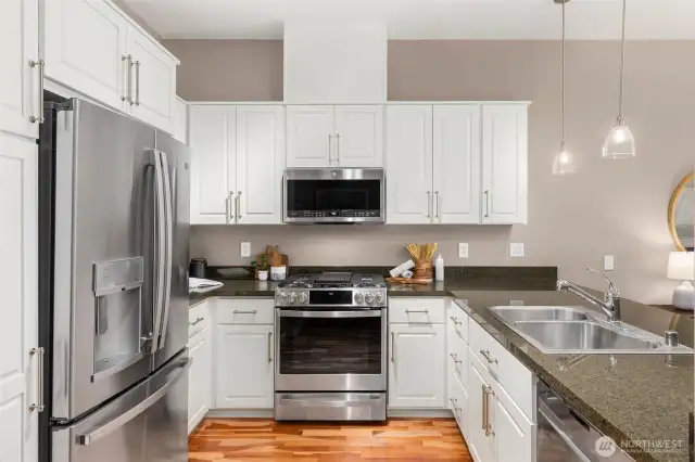 Kitchen has been updated with cabinets and all stainless appliances.
