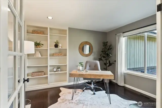 Office w/custom built-ins and lots of light.