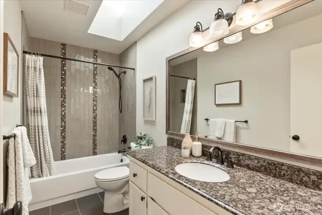Just updated guest bath w/artisan tile work