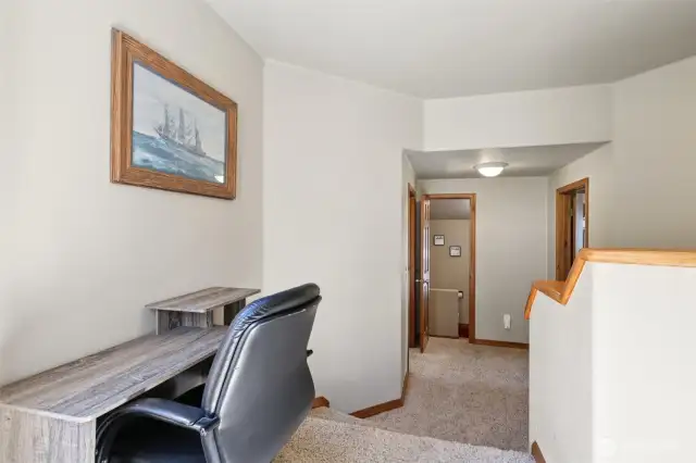 Main house: Guest bedrooms on right and left bathroom straight ahead.