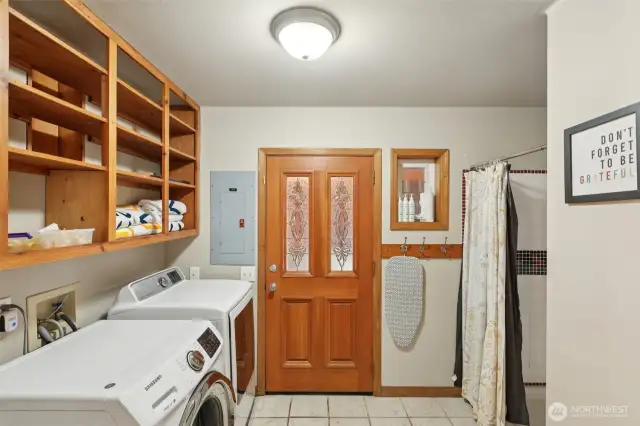 Main house: downstairs laundry room, door leads to breezeway for ADU