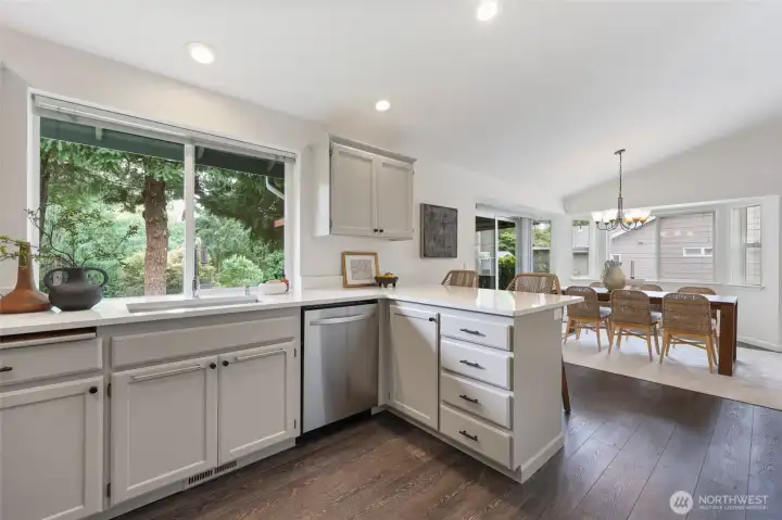Well chosen materials in this 2022 remodel - quartz counters, stainless steel farm sink, professionally painted in 2023. All stainless steel appliances too.