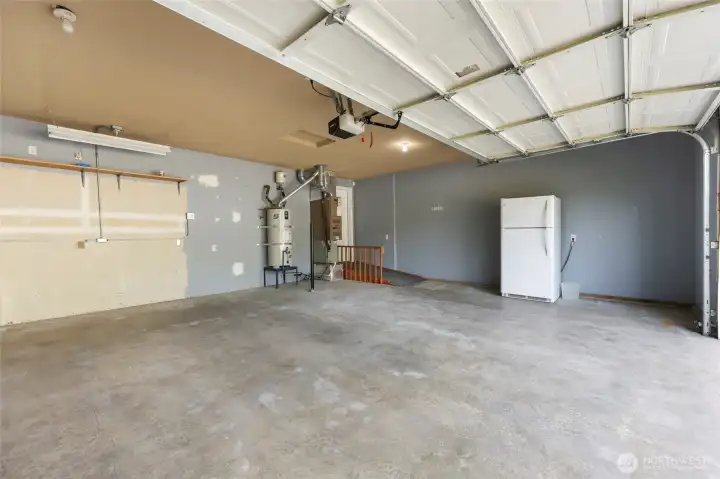 Generous double garage (refrigerator stays with home).
