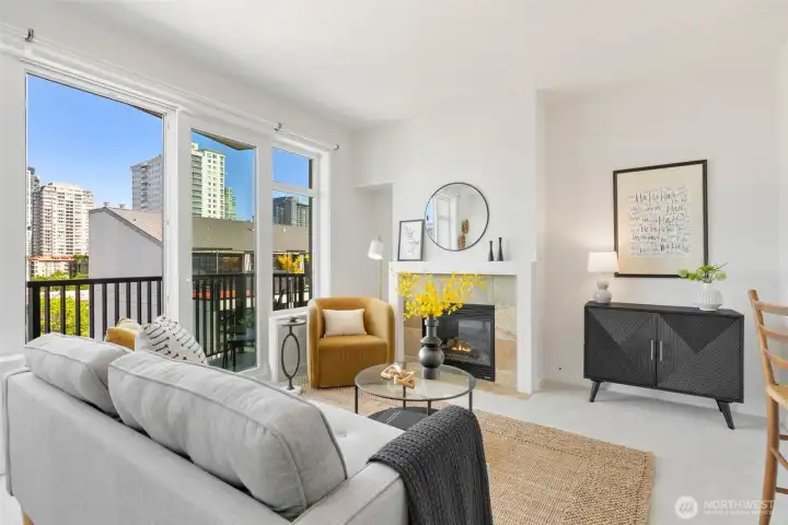 The living room is spacious, and centered on a gas firelplace- super cozy on those winter evenings.