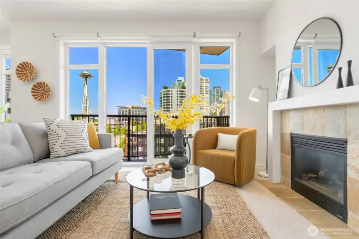 The Living room enjoys a wall of windows, and a European glass door to the balcony- this door can glide open, or can be tilted for venting at the top for great air circulation.