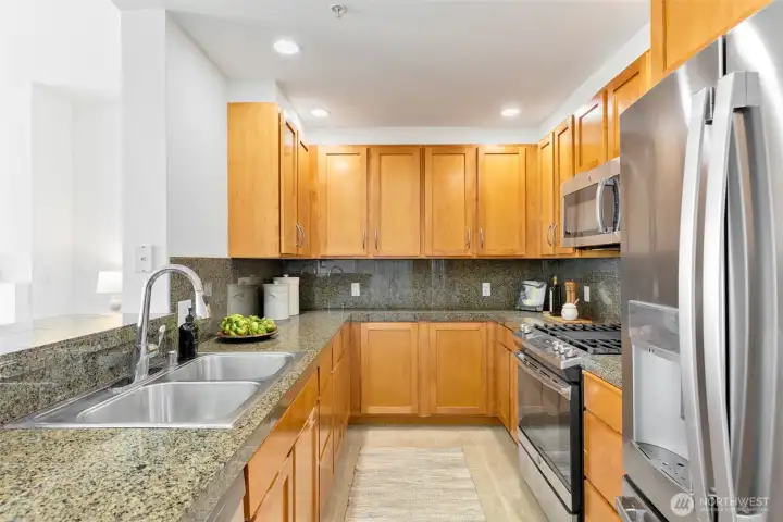 The kitchen is super functional- there is a ton of cabinet and counter space here!