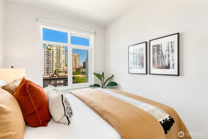 This is a Queen bed, and there is plenty of space for a chair or dresser, although you probably don't need a dresser because there is also a large walk-in closet.
