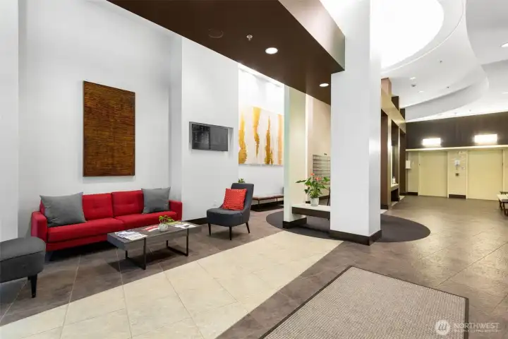 The lobby- The Vine building has lots of amenities- a fitness center, Guest suite, party room, and rooftop deck on the 6th floor of the low rise section.
