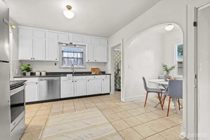 Spacious kitchen with classic breakfast nook.