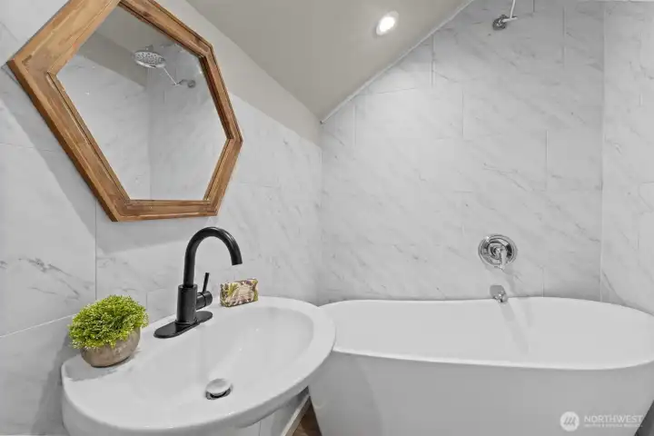 Upstairs bathroom with an awesome soaking tub.