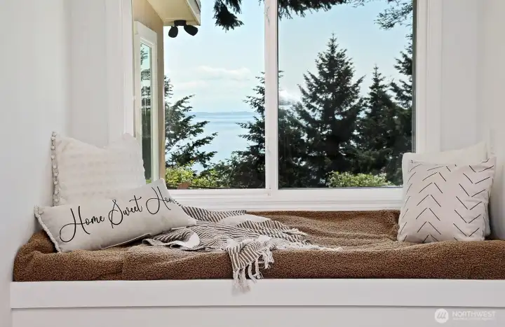 A sweet place to hunker down with a good book or even an afternoon nap. Storage under the bench seat, too!