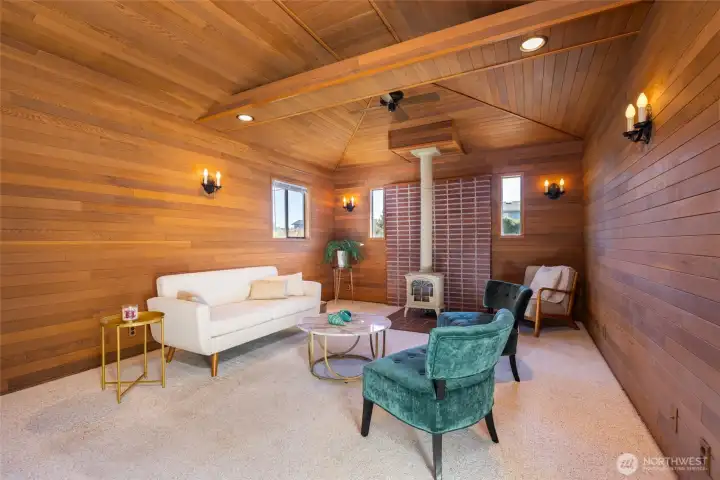 Off the kitchen is another generous living/bonus room with another fireplace to make this room extra cozy.