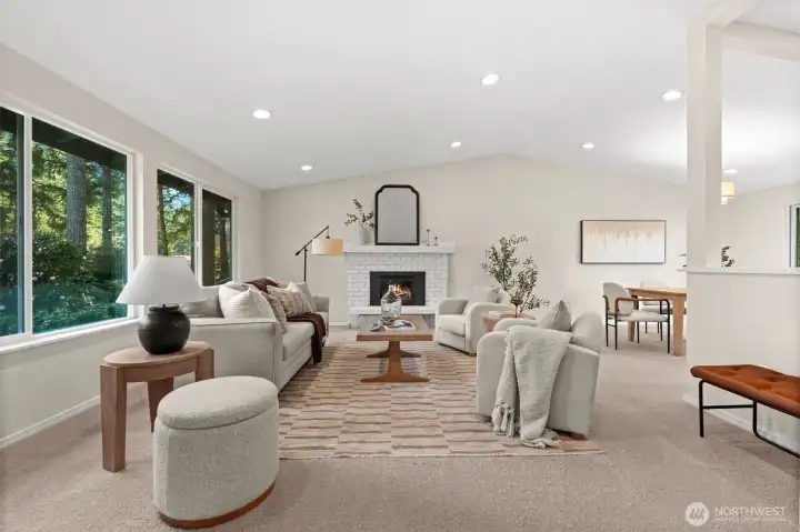 The interplay of fire and light. This architectural fireplace adds a layer of warmth to the room’s expansive proportions, acting as a refined focal point that draws the eye and invites you to stay.