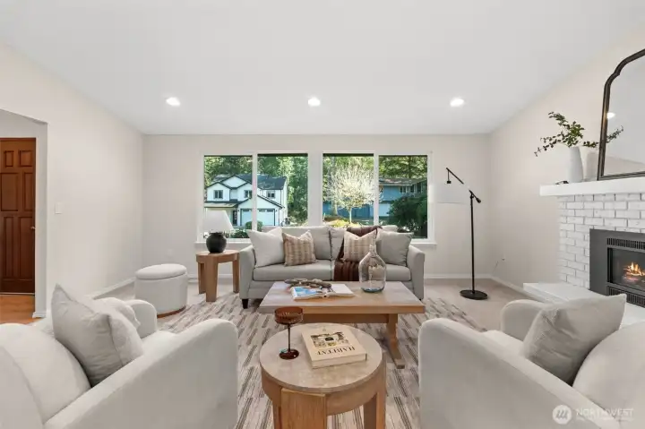 Light always has an opportunity to illuminate this area with these grand, bold, great room windows.