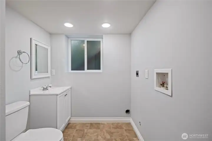 laundry room is combined with half bath