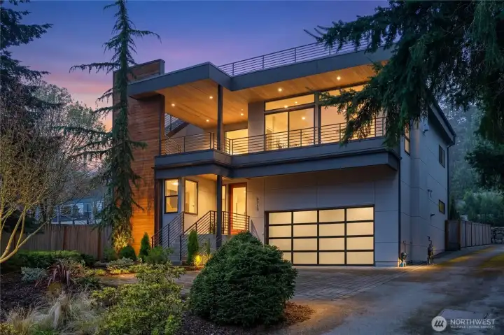 Tucked away in a quiet Matthews Beach enclave, this 4 bedroom / 3 bathroom modern presents clean lines, open spaces and warm finishes.