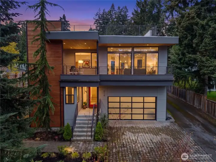Sited and set back on a large level lot for premium lake and Rainier views. An oversized 2 car garage with built-in storage, driveway and extra off-street parking in front.