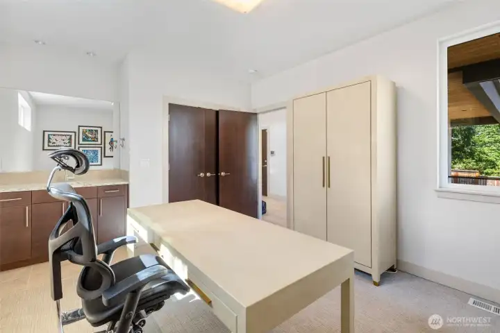 Currently used as an office, with a wet bar, this flexible space could be a 4th bedroom or lower level media room.