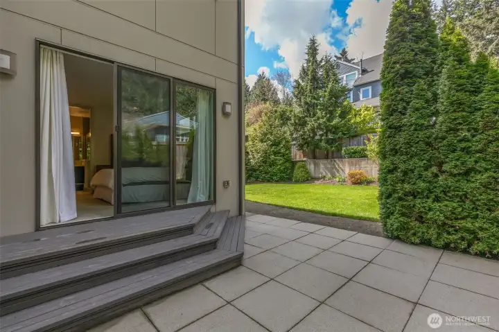 Sliders from the primary suite directly onto your private patio and fenced yard.