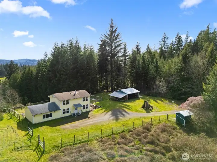 A private and serene retreat on 2.5 acres just minutes from town.