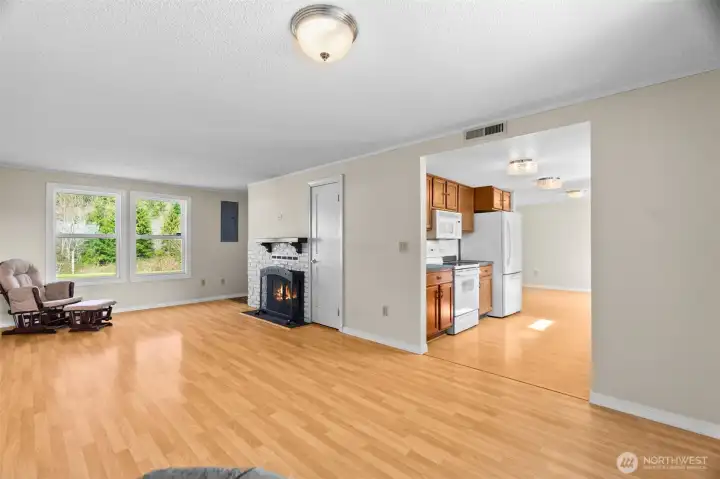 Another view of the large living room that opens to the galley kitchen.