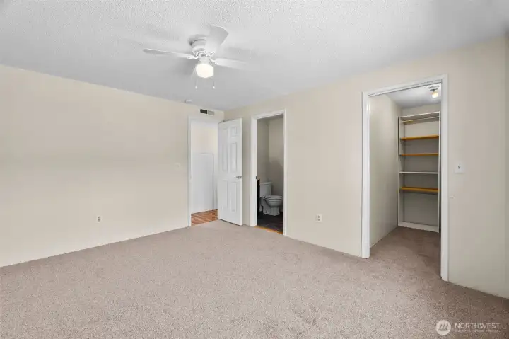 Another view of the primary bedroom.