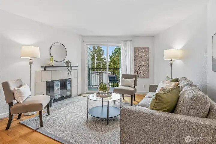 Bright top floor living with fireplace and private balcony, why keep renting