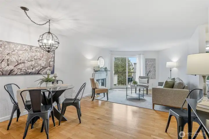 Gleaming hardwoods and an open layout paired with a cozy fireplace make this a perfect city retreat