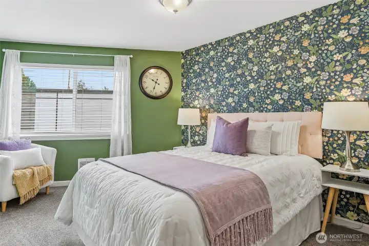 Charming wallpaper makes the bedroom a cozy retreat