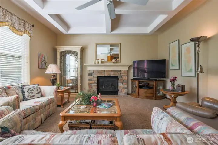 Family Room with Gas Fireplace and tons of windows. Opens to spacious covered back deck.