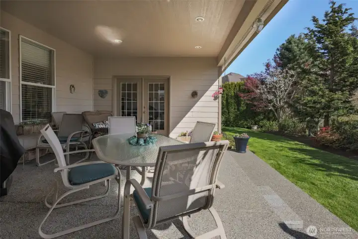 Spacious, private back patio and landscaped yard